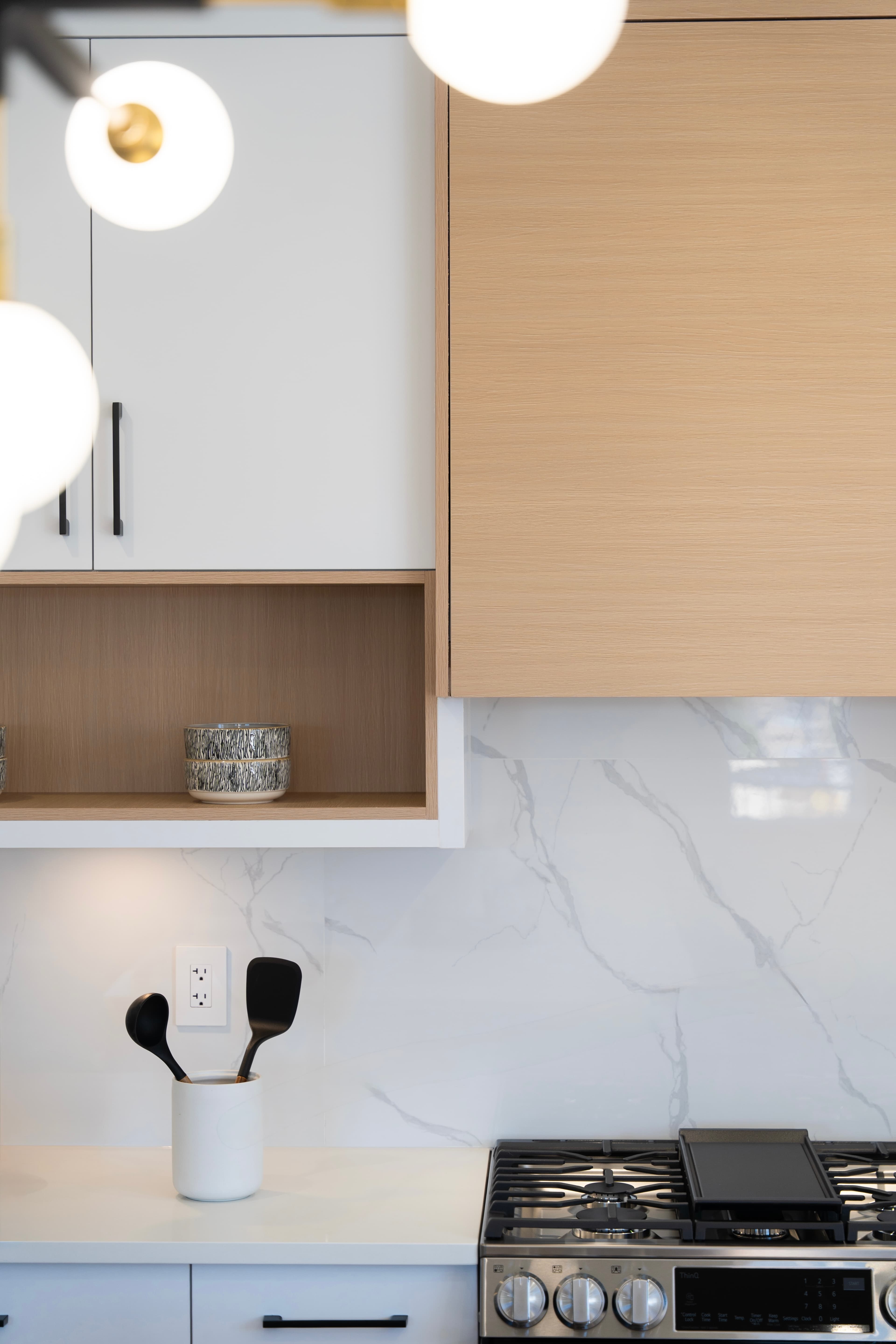 Cabinetry and pendant lighting detail in the kitchen at Willoughby Row