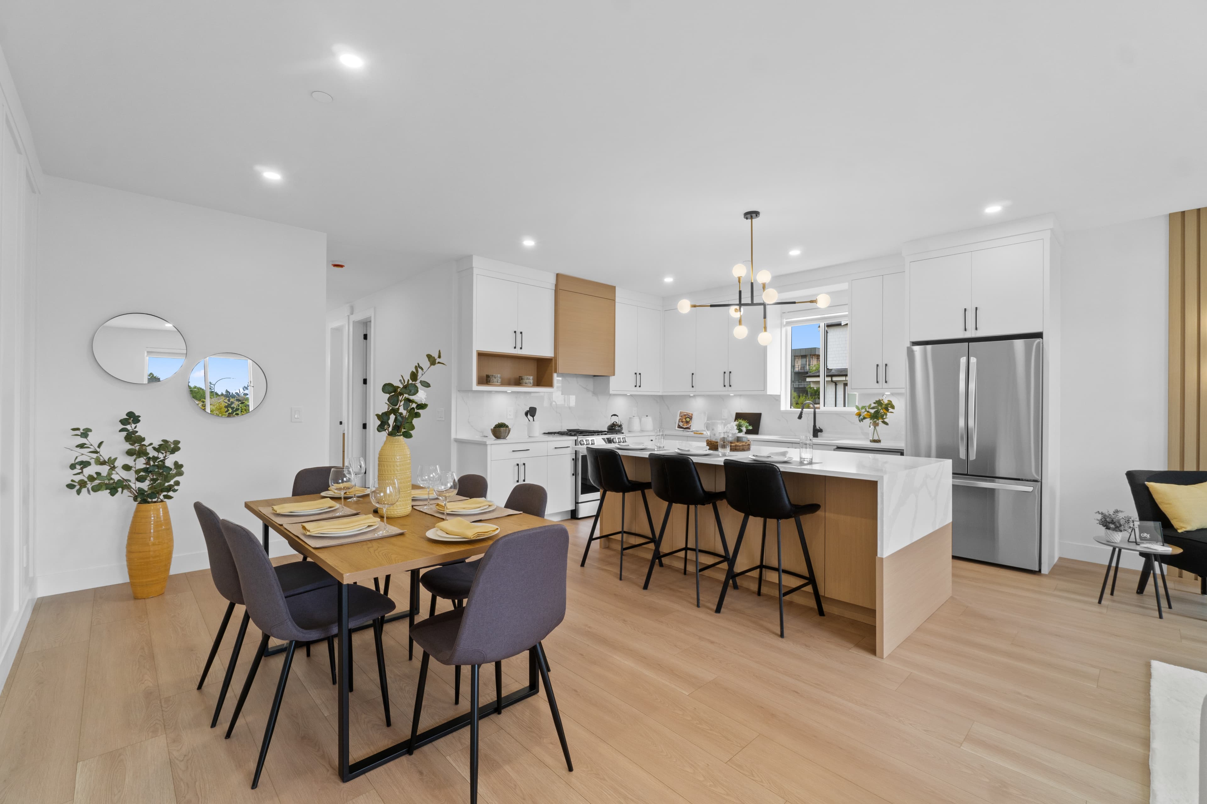 Kitchen and dining area at Willoughby Row with waterfall island seating