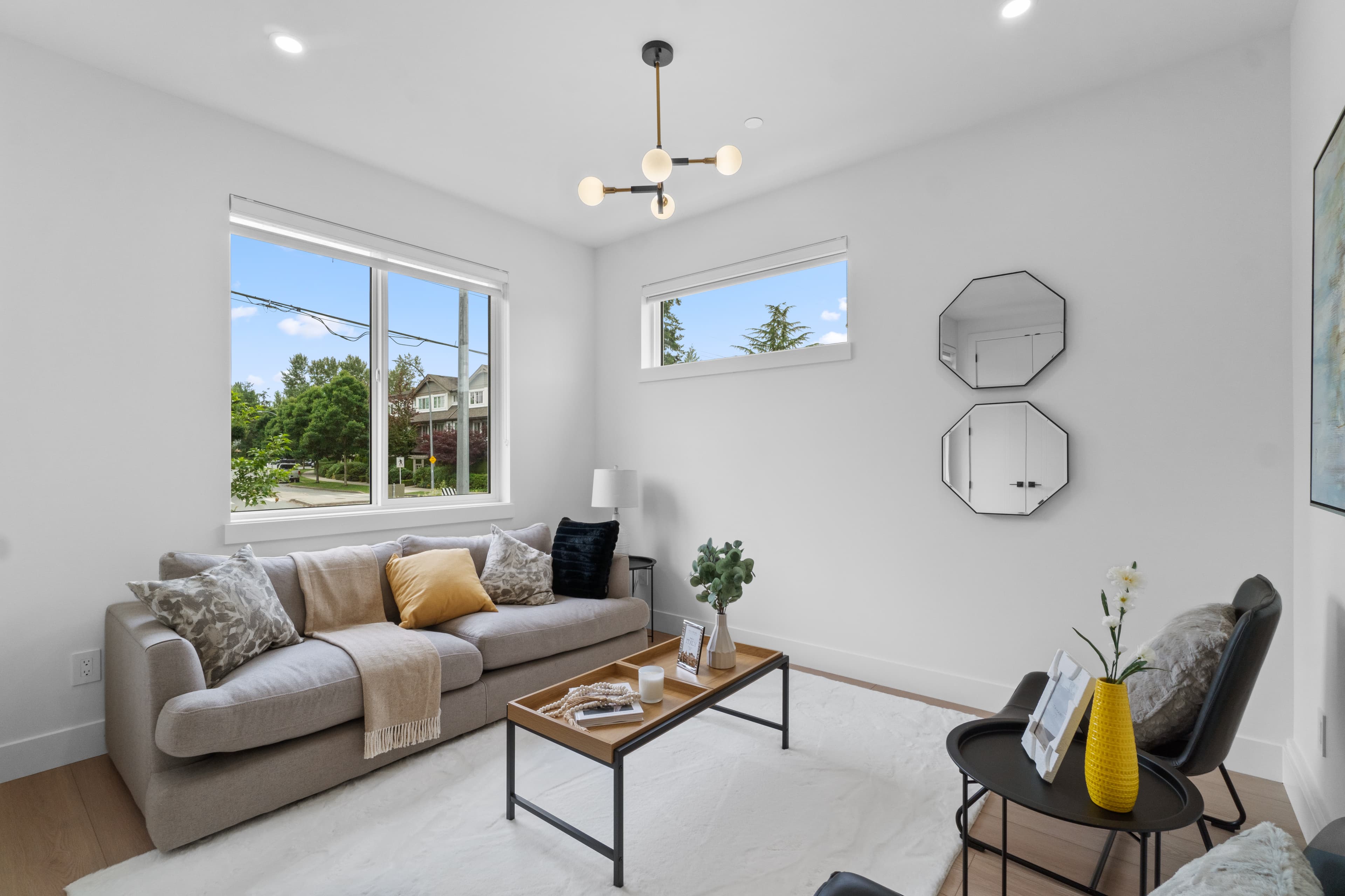Bright living room at Willoughby Row with large windows