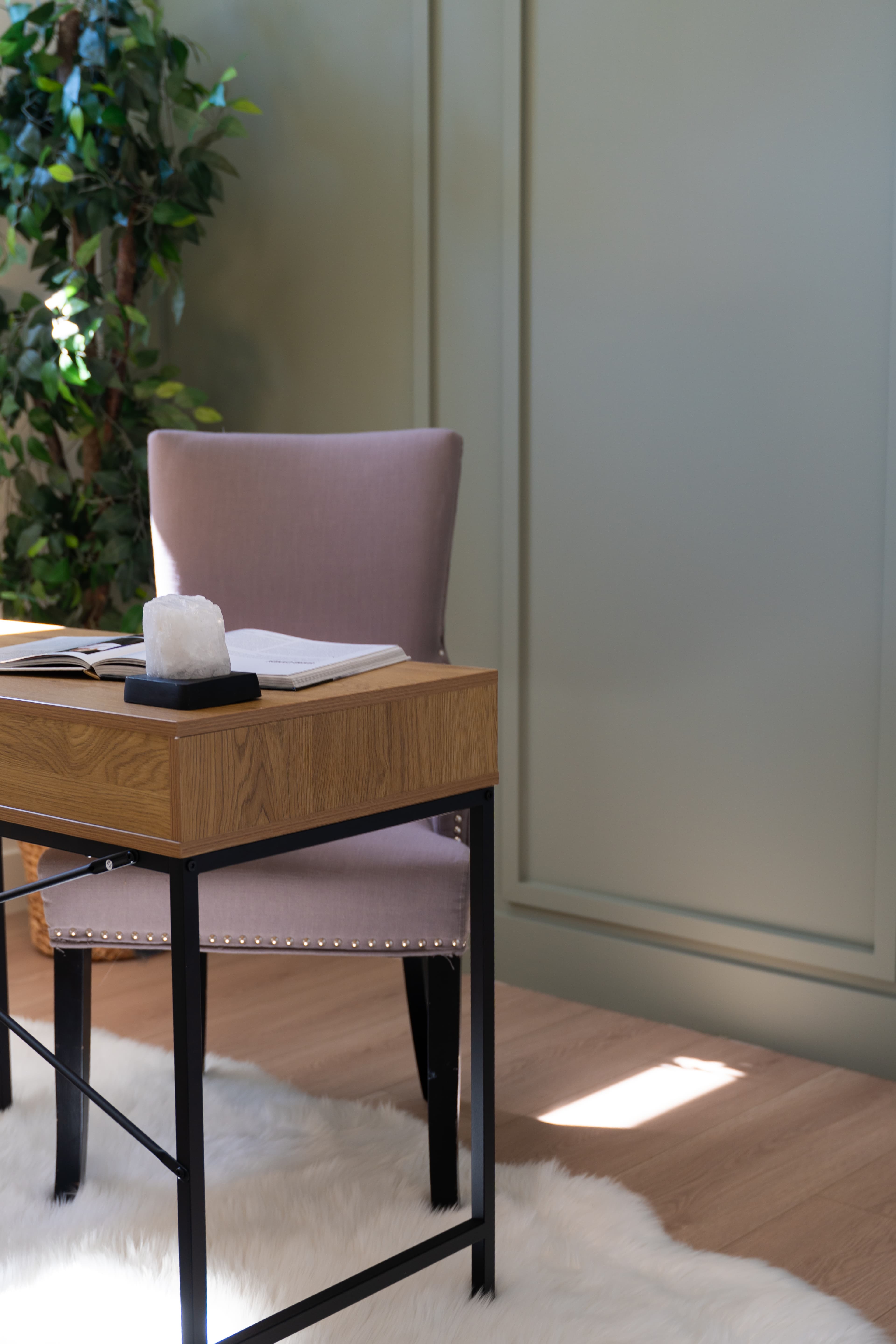Home office desk detail at Willoughby Row with upholstered chair